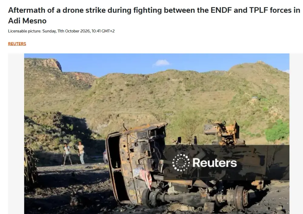 Reuters picture, dated 11 October 2026, captioned “Aftermath of a drone strike during fighting between the ENDF and TPLF forces in Adi Mesno”. It shows the same burnt-out, overturned vehicle used in Al Arabiya's graphic. Screenshot of the Reuters picture page.
